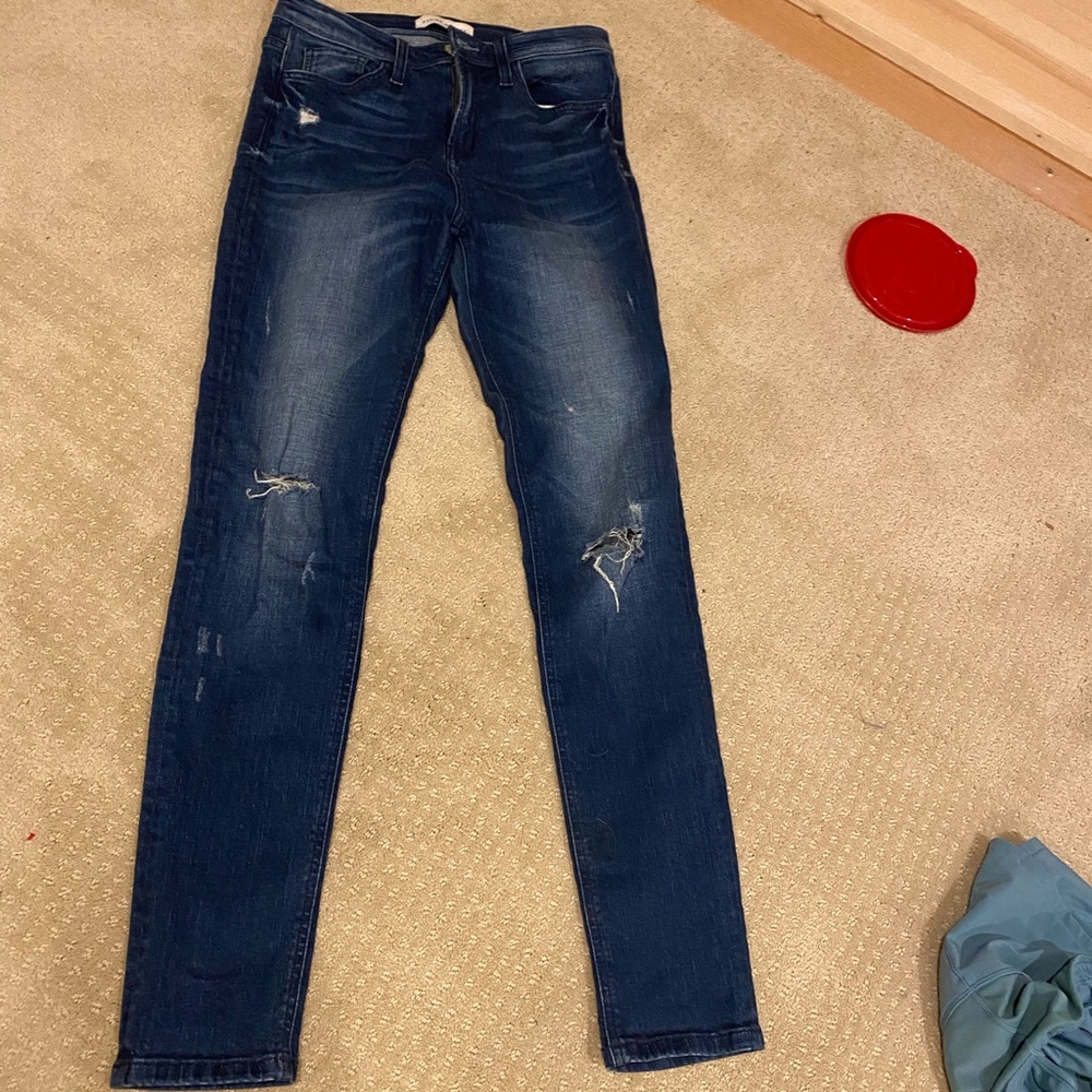 Blue jeans with a rips